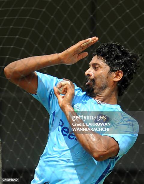 Sri Lankan cricketer Chanaka Welegedara delivers a ball during a practice session at the P.Sara Stadium in Colombo on April 20, 2010. Sri Lanka has...