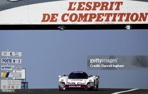 Martin Brundle drives the Silk Cut Jaguar XJR-12 LM during the FIA World Sportscar Championship 24 Hours of Le Mans race on 17 June 1990 at the...
