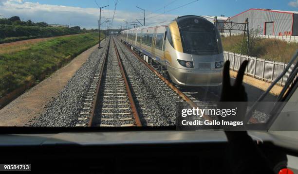 Gautrain driver greets a colleague between Marlboro Station and O.R Tambo International Airport on April 20, 2010 in Johannesburg, South Africa. This...