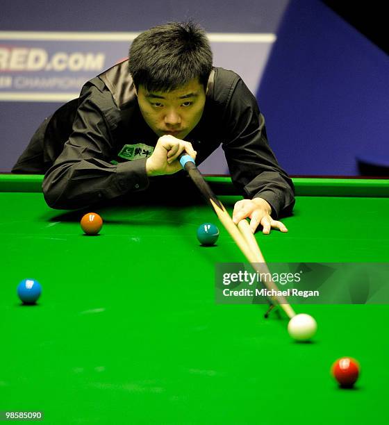 Ding Junhui of China plays a shot during the Betfred.com World Snooker Championships at the Crucible Theatre on April 21, 2010 in Sheffield, England.