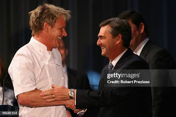 Gordon Ramsay and Premier John Brumby shake hands after the cutting of the ribbon for the opening of the Crown Metropol hotel on April 21, 2010 in...