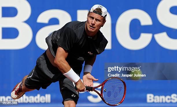 Lleyton Hewitt of Australia serves the ball to Eduardo Schwank of Argentina on day three of the ATP 500 World Tour Barcelona Open Banco Sabadell 2010...