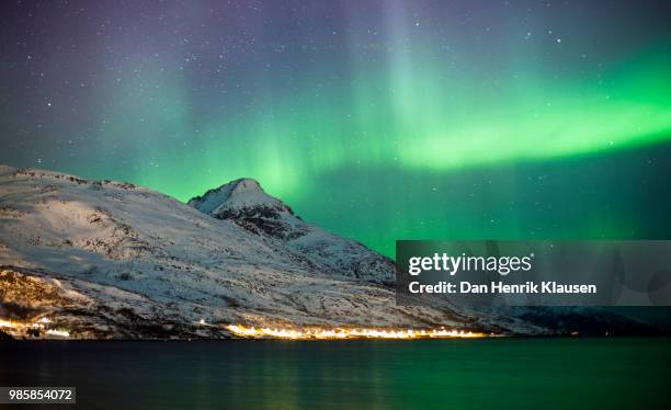 aurora and small village - klausen stock pictures, royalty-free photos & images