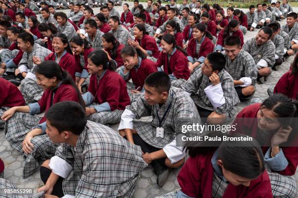 Bhutanese students gather for a meeting the Pelkhil high school wearing their traditional Bhutanese uniform that is required for all students on June...