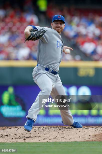 Mike Montgomery of the Chicago Cubs throws a pitch during the game against the Cincinnati Reds at Great American Ball Park on June 24, 2018 in...