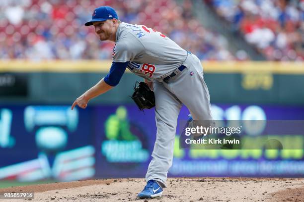 Mike Montgomery of the Chicago Cubs throws a pitch during the game against the Cincinnati Reds at Great American Ball Park on June 24, 2018 in...