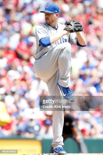 Mike Montgomery of the Chicago Cubs throws a pitch during the game against the Cincinnati Reds at Great American Ball Park on June 24, 2018 in...