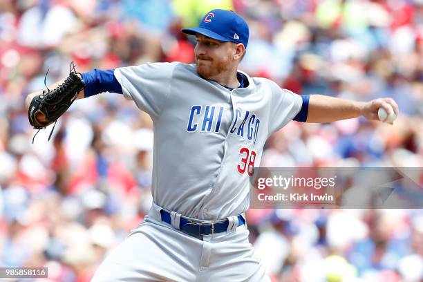 Mike Montgomery of the Chicago Cubs throws a pitch during the game against the Cincinnati Reds at Great American Ball Park on June 24, 2018 in...