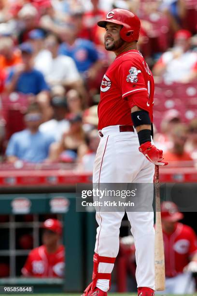 Eugenio Suarez of the Cincinnati Reds reacts after hitting a foul ball during the game against the Chicago Cubs at Great American Ball Park on June...