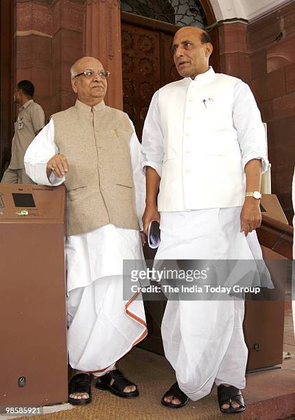 President Rajnath Singh with Lalji Tandon after the Parliament session in New Delhi on April 20, 2010.