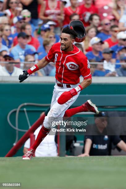 Billy Hamilton of the Cincinnati Reds runs home to score a run during the game against the Chicago Cubs at Great American Ball Park on June 24, 2018...