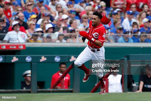 Billy Hamilton of the Cincinnati Reds runs home to score a run during the game against the Chicago Cubs at Great American Ball Park on June 24, 2018...