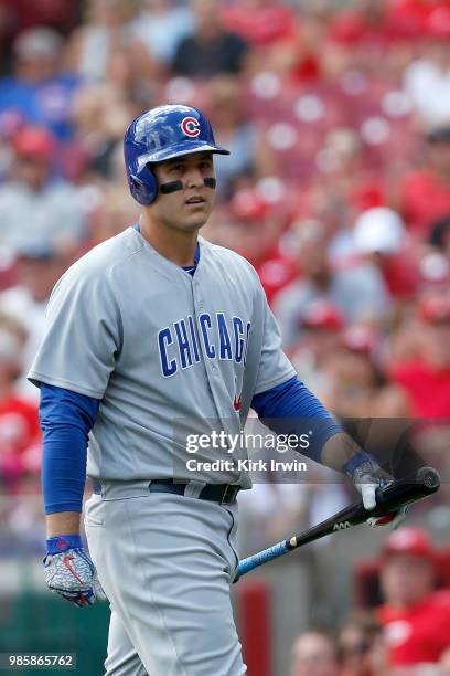 Anthony Rizzo of the Chicago Cubs walks off of the field after striking out during the game against the Cincinnati Reds at Great American Ball Park...