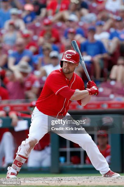 Scott Schebler of the Cincinnati Reds takes an at bat during the game against the Chicago Cubs at Great American Ball Park on June 24, 2018 in...