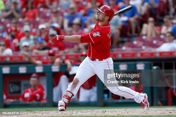 Scott Schebler of the Cincinnati Reds takes an at bat during the game against the Chicago Cubs at Great American Ball Park on June 24, 2018 in...