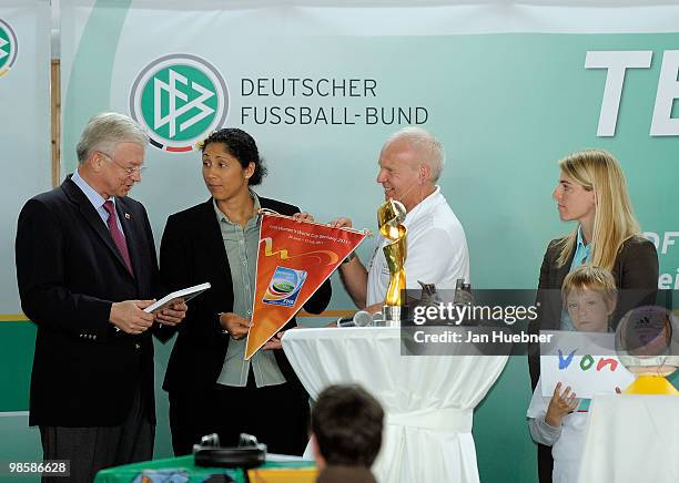 Roland Koch, Prime Minister of Hesse, President of the Organising Committee Germany of the FIFA Women's World Cup 2011 Steffi Jones, moderator...