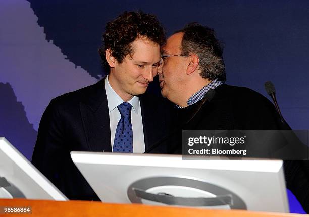 John Elkann, incoming chairman of Fiat SpA, left, listens to Sergio Marchionne, chief executive officer of Fiat SpA, as they arrive for a Fiat SpA...
