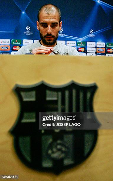 Barcelona's coach Josep Guardiola attends a press conference on the eve of his team's UEFA Champions League football match against Arsenal at New...