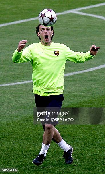 Barcelona's Argentinian defender Gabriel Milito takes part in a training session on the eve of his team's UEFA Champions League football match...