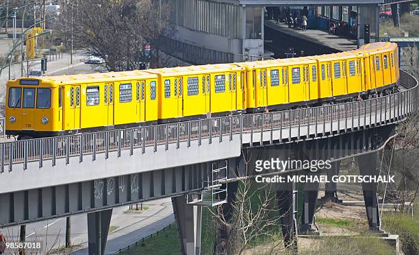 Train of Berlin's metro "U-Bahn" number U1 drives out of the Moeckernbruecke station on April 8, 2010 in Berlin. AFP PHOTO DDP / MICHAEL GOTTSCHALK...
