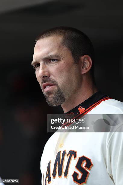 Mark DeRosa of the San Francisco Giants watches from the dugout during the game between the Pittsburgh Pirates and the San Francisco Giants on...