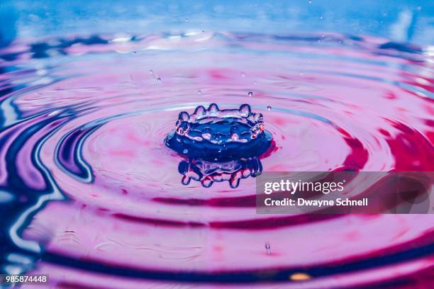 pink water splash - schnell stock pictures, royalty-free photos & images