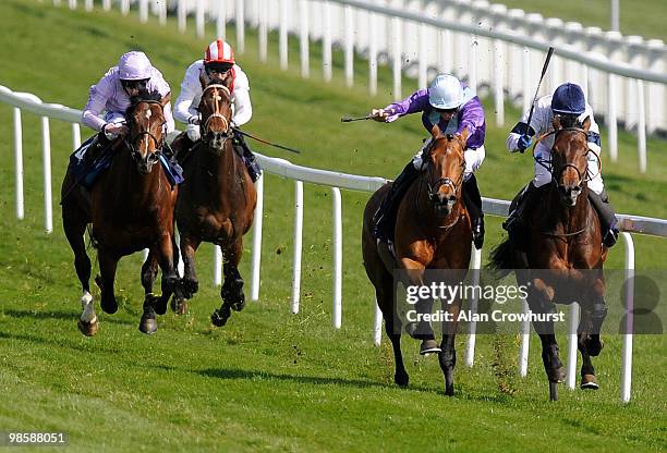 Jimmy Fortune on Dreamspeed on their way to winning The Investec Derby Trial from Hayley Turner on Prompter at Epsom racecourse on April 21, 2010 in...