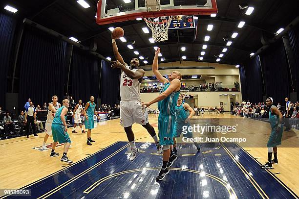Will Daniels of the Bakersfield Jam goes to the basket against Greg Stiemsma of the Sioux Falls Skyforce during the D-League game on April 2, 2010 at...