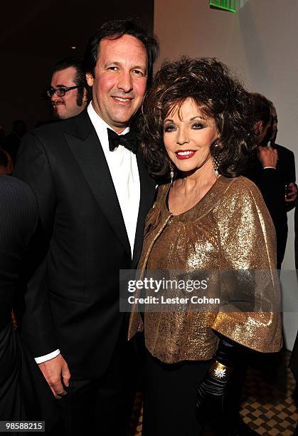 Actress Joan Collins and Percy Gibson arrives at the 52nd Annual GRAMMY Awards - Salute To Icons Honoring Doug Morris held at The Beverly Hilton...