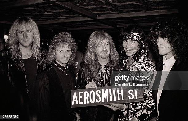 American rock band Aerosmith host a party for Les Paul celebrating his 75th birthday on June 12, 1990 at The Hard Rock Cafe in New York City, New...