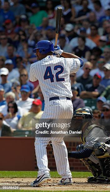 Derrek Lee of the Chicago Cubs, wearing a number 42 jersey in honor of Jackie Robinson, prepares to bat against the Milwaukee Brewers at Wrigley...