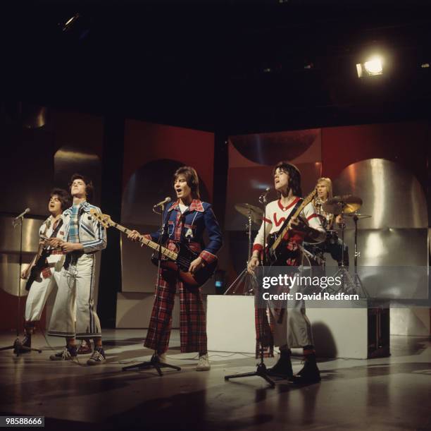 Eric Faulkner, Les McKeown, Alan Longmuir, Stuart Wood and Derek Longmuir of the Bay City Rollers perform on a BBC television show in 1975.