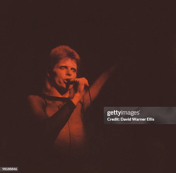 Singer David Bowie performs on stage during the Ziggy Stardust tour in 1973.