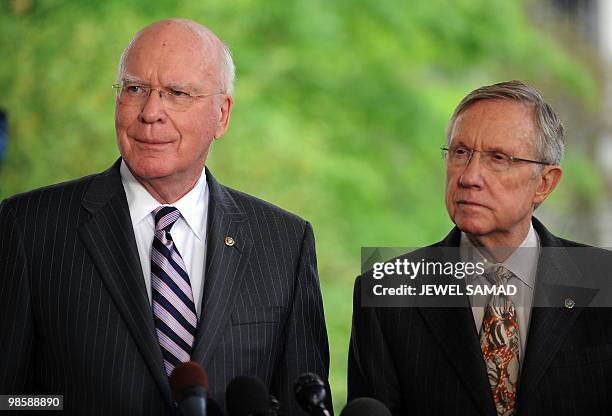 Senator Patrick Leahy , D-VT, speaks to reporters as Senate Majority Leader Harry Reid looks on following their meeting with US President Barack...