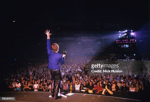 Singer Jon Bon Jovi of American band Bon Jovi performs on stage in Osaka in January 2003.