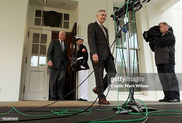 Senate Majority Leader Harry Reid , and Judiciary Committee Chairman Sen. Patrick Leahy , walk out of the West Wing of the White House after meeting...