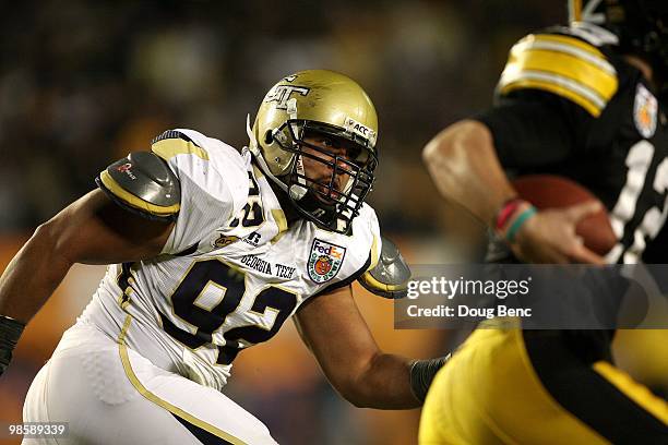 Defensive lineman Jason Peters of the Georgia Tech Yellow Jackets pressures the quarterback against the Iowa Hawkeyes during the FedEx Orange Bowl at...