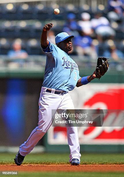 Third baseman Alberto Callaspo of the Kansas City Royals throws the ball to first base in a game against the Detroit Tigers on April 8, 2010 at...