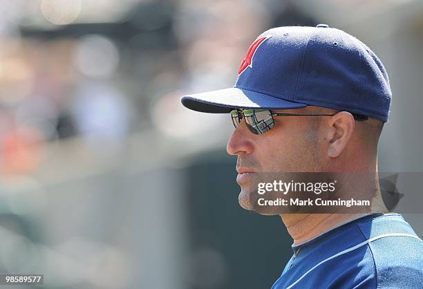 Manny Acta of the Cleveland Indians looks on from the dugout against the Detroit Tigers during the game at Comerica Park on April 10, 2010 in...