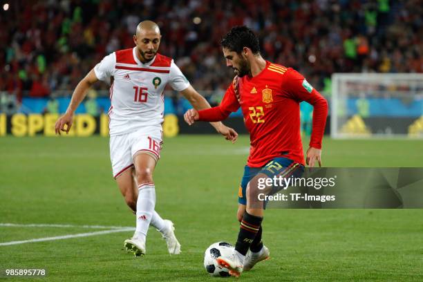 Isco Alarcon of Spain and Nordin Amrabat of Morocco battle for the ball during the 2018 FIFA World Cup Russia group B match between Spain and Morocco...