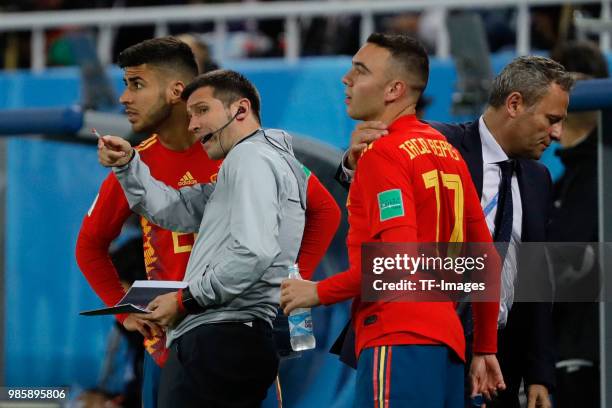 Albert Celades speaks with Marco Asensio of Spain and Iago Aspas of Spain during the 2018 FIFA World Cup Russia group B match between Spain and...