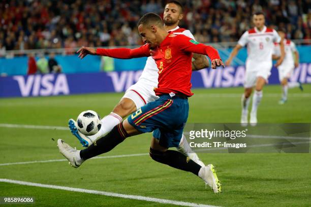 Rodrigo Moreno of Spain and Manuel da Costa of Morocco battle for the ball during the 2018 FIFA World Cup Russia group B match between Spain and...