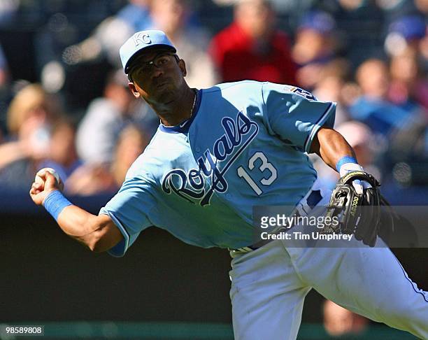 Third baseman Alberto Callaspo of the Kansas City Royals throws the ball to first base in a game against the Detroit Tigers on April 8, 2010 at...