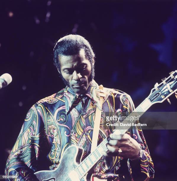 American singer, songwriter and guitarist Chuck Berry performs live on stage during recording of the BBC television show 'Sounds for Saturday' at BBC...