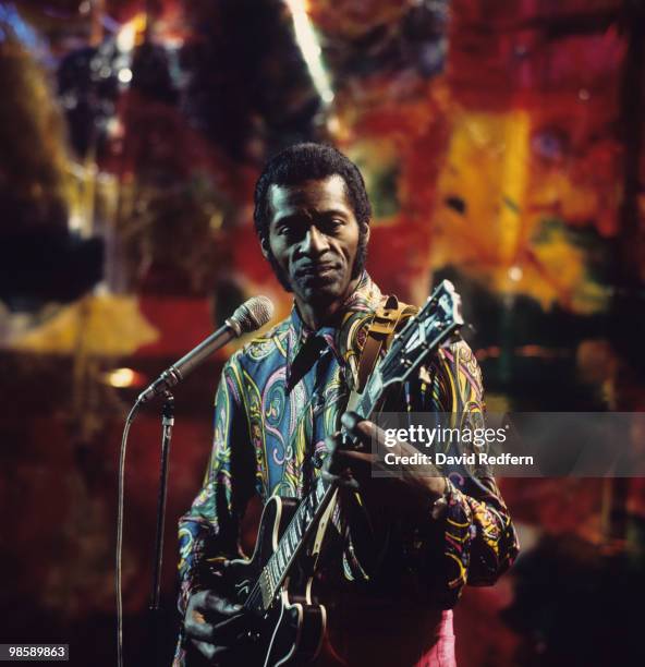 American singer, songwriter and guitarist Chuck Berry performs live on stage during recording of the BBC television show 'Sounds for Saturday' at BBC...