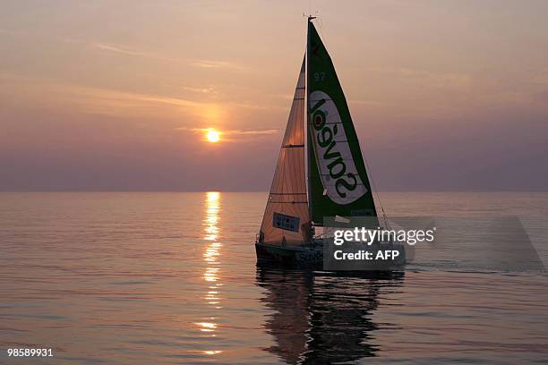 English skipper Samantha Davies and French skipper Romain Attanasio sail off French's coast on their "Saveol" monohull on April 18 during the AG2R LA...