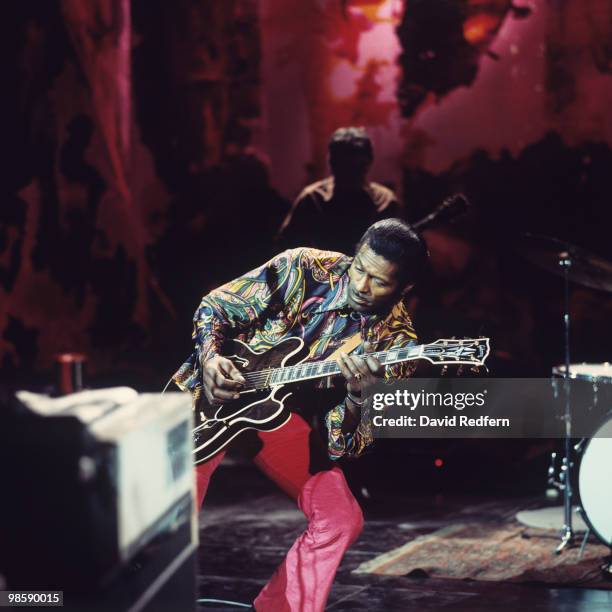 American singer, songwriter and guitarist Chuck Berry performs live on stage during recording of the BBC television show 'Sounds For Saturday' at BBC...