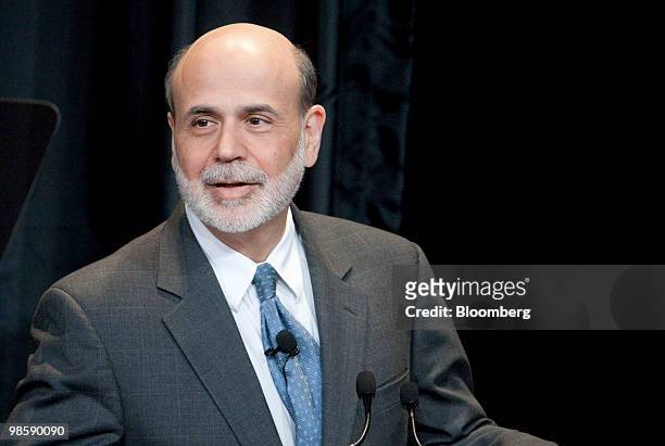 Ben S. Bernanke, chairman of the U.S. Federal Reserve, speaks at the unveiling of the new $100 note at the Treasury in Washington, D.C., U.S., on...