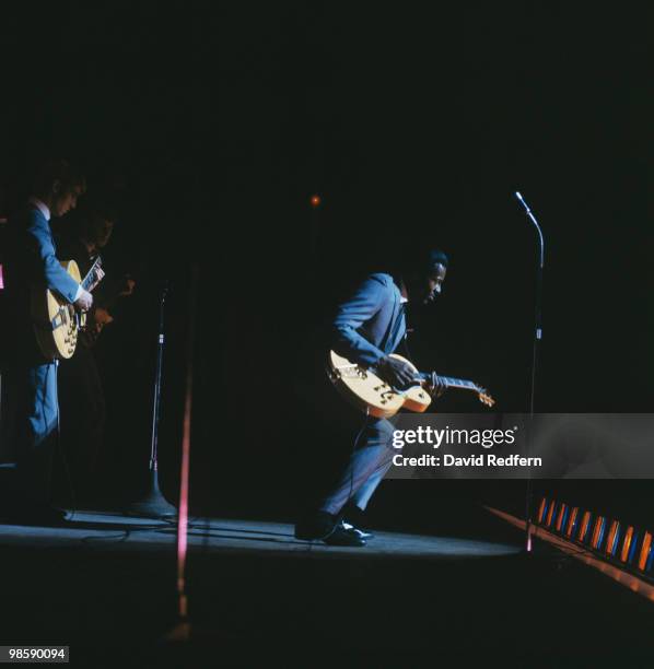 American singer, songwriter and guitarist Chuck Berry performs live on stage at Hammersmith Odeon in London in January 1965.