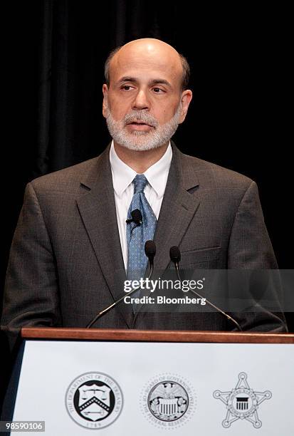 Ben S. Bernanke, chairman of the U.S. Federal Reserve, speaks at the unveiling of the new $100 note at the Treasury in Washington, D.C., U.S., on...